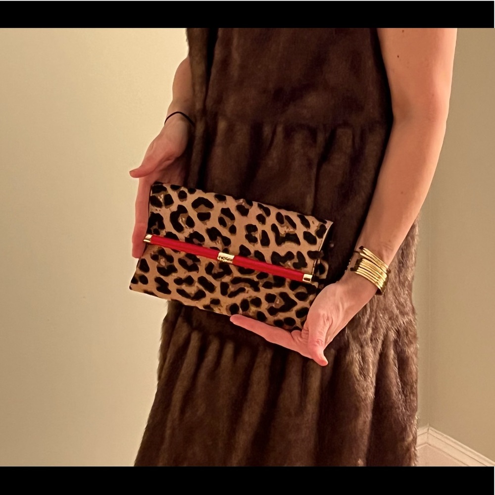 DVF cheetah print clutch with red accent